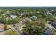 Aerial view of a home marked with a pin, located in a serene, tree-filled residential area at 5001 W Dickens Ave, Tampa, FL 33629