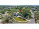 Aerial shot pinpointing a lovely home nestled among lush trees, surrounded by a well-maintained neighborhood at 5001 W Dickens Ave, Tampa, FL 33629