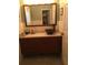 Bathroom vanity featuring a vessel sink and a modern wood cabinet with a large mirror at 5001 W Dickens Ave, Tampa, FL 33629
