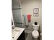 Modern bathroom features a marble countertop vanity and glass-enclosed shower at 5001 W Dickens Ave, Tampa, FL 33629
