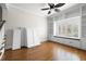 Bedroom features wood flooring, shutters, and built in shelving at 5001 W Dickens Ave, Tampa, FL 33629