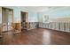 Open room featuring wood flooring at 5001 W Dickens Ave, Tampa, FL 33629