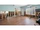 Exercise room featuring hardwood floors, recessed lights and large windows at 5001 W Dickens Ave, Tampa, FL 33629
