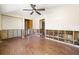 Open living area with wood flooring and ceiling fan at 5001 W Dickens Ave, Tampa, FL 33629