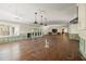 Open concept living room with hardwood floors, recessed lights, and patio access at 5001 W Dickens Ave, Tampa, FL 33629