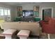 Cozy living room with neutral colors, decorative art, and plush seating at 5001 W Dickens Ave, Tampa, FL 33629