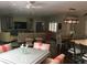 Bright, open-concept living space combining living, dining, and kitchen areas at 5001 W Dickens Ave, Tampa, FL 33629