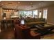 Open concept living and dining area with hardwood floors and plenty of natural light at 5001 W Dickens Ave, Tampa, FL 33629