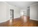 Large living room featuring hardwood floors and access to the bathroom at 5001 W Dickens Ave, Tampa, FL 33629