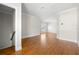 Bright, spacious living room with hardwood floors and neutral walls, perfect for entertaining at 5001 W Dickens Ave, Tampa, FL 33629