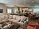 Open-concept living area seamlessly connects to a modern kitchen and multiple dining areas at 5001 W Dickens Ave, Tampa, FL 33629
