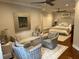 Luxurious main bedroom suite with sitting area, ceiling fans, and comfortable furnishings at 5001 W Dickens Ave, Tampa, FL 33629