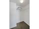 Walk-in closet with wood floors and white wire shelving for storage at 502 Hammock Pine Blvd # 502, Clearwater, FL 33761