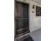 Front door and entryway of condo with brick detailing at 502 Hammock Pine Blvd # 502, Clearwater, FL 33761