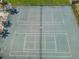 Aerial view of tennis courts showcasing the well-maintained green surface at 502 Hammock Pine Blvd # 502, Clearwater, FL 33761