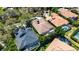 Another expansive aerial view showcasing property with mature trees, a pool and neighboring homes at 5316 Candler View Dr, Lithia, FL 33547