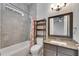 Bathroom with a shower and tub combination, granite countertops and great lighting at 5316 Candler View Dr, Lithia, FL 33547