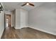 Spacious bedroom with hardwood flooring and neutral walls, ready for personalized decor at 5316 Candler View Dr, Lithia, FL 33547