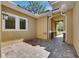 Charming courtyard featuring brick pavers and ample natural light creating a relaxing outdoor space at 5316 Candler View Dr, Lithia, FL 33547