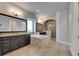 Main bathroom features a double vanity, a soaking tub, and a walk-in shower at 5316 Candler View Dr, Lithia, FL 33547