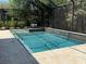 This beautifully landscaped private pool and spa are enclosed with screens at 5316 Candler View Dr, Lithia, FL 33547