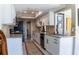 Well-lit kitchen featuring modern appliances, granite countertops, and ample cabinet space at 600 Eleuthera Dr, Punta Gorda, FL 33950