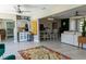 Open-concept layout connects living area, kitchen, and dining space with modern decor at 600 Eleuthera Dr, Punta Gorda, FL 33950