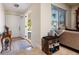 Bright foyer with tile flooring, shoe storage, and view to the outside at 6001 19Th Ne St, St Petersburg, FL 33703