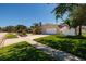 Charming single-story home with a lush lawn and a two-car garage at 6001 19Th Ne St, St Petersburg, FL 33703