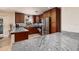 Stylish kitchen with granite counters, stainless steel appliances, and tiled backsplash at 6001 19Th Ne St, St Petersburg, FL 33703