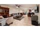 Spacious living room featuring tile flooring, an open floor plan, and dining area at 6001 19Th Ne St, St Petersburg, FL 33703