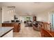 Spacious living room open to the dining room with tile flooring and comfortable seating at 6001 19Th Ne St, St Petersburg, FL 33703