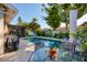 Beautiful pool area with an outdoor grill and screened-in lanai at 6001 19Th Ne St, St Petersburg, FL 33703
