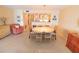 Open-concept living space flowing from the dining room, creating an inviting and airy atmosphere at 6060 Shore S Blvd # 302, Gulfport, FL 33707