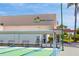 Shuffleboard courts with benches offering residents a space to relax and socialize at 6060 Shore S Blvd # 302, Gulfport, FL 33707