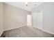 Bedroom with standard closet and carpeted floors at 6398 Bradford Woods Drive, Zephyrhills, FL 33542