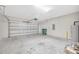 Spacious two car garage with automatic door at 6398 Bradford Woods Drive, Zephyrhills, FL 33542