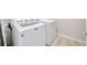 Laundry room with new washer and dryer at 6398 Bradford Woods Drive, Zephyrhills, FL 33542