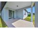 Covered patio with sliding glass door leading inside at 6398 Bradford Woods Drive, Zephyrhills, FL 33542
