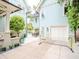 Spacious backyard perfect for recreation with a basketball hoop, ping pong, and lush landscaping at 712 S Newport Ave, Tampa, FL 33606