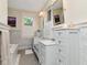 Bathroom features marble walls, decorative tile flooring, and modern fixtures at 712 S Newport Ave, Tampa, FL 33606