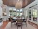 Cozy breakfast nook with a round table, comfortable seating, and lots of natural light; perfect for casual meals at 712 S Newport Ave, Tampa, FL 33606