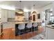 Spacious kitchen with a large island, modern appliances, and ample counter space; ideal for cooking and entertaining at 712 S Newport Ave, Tampa, FL 33606