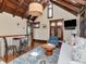 Cozy living room area with hardwood floors, wooden ceiling beams, and lofted ceiling at 712 S Newport Ave, Tampa, FL 33606