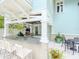 Outdoor kitchen and grill area with bar seating, and a pleasant entertaining space at 712 S Newport Ave, Tampa, FL 33606