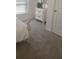 Cozy bedroom with soft carpet and a white dresser featuring a decorative lamp and vase at 7530 Broad Pointe Dr, Zephyrhills, FL 33540