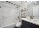 Bathroom featuring updated vanity and shower at 8111 Country Club N Rd, St Petersburg, FL 33710