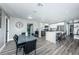 Open concept kitchen with stainless steel appliances and a large island at 8201 Ridge Rd, Seminole, FL 33772