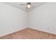 Empty bedroom with neutral carpet, a ceiling fan, and plenty of natural light at 8206 Leafy Ct, Port Richey, FL 34668