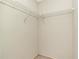 Walk in closet with wall shelving at 8206 Leafy Ct, Port Richey, FL 34668